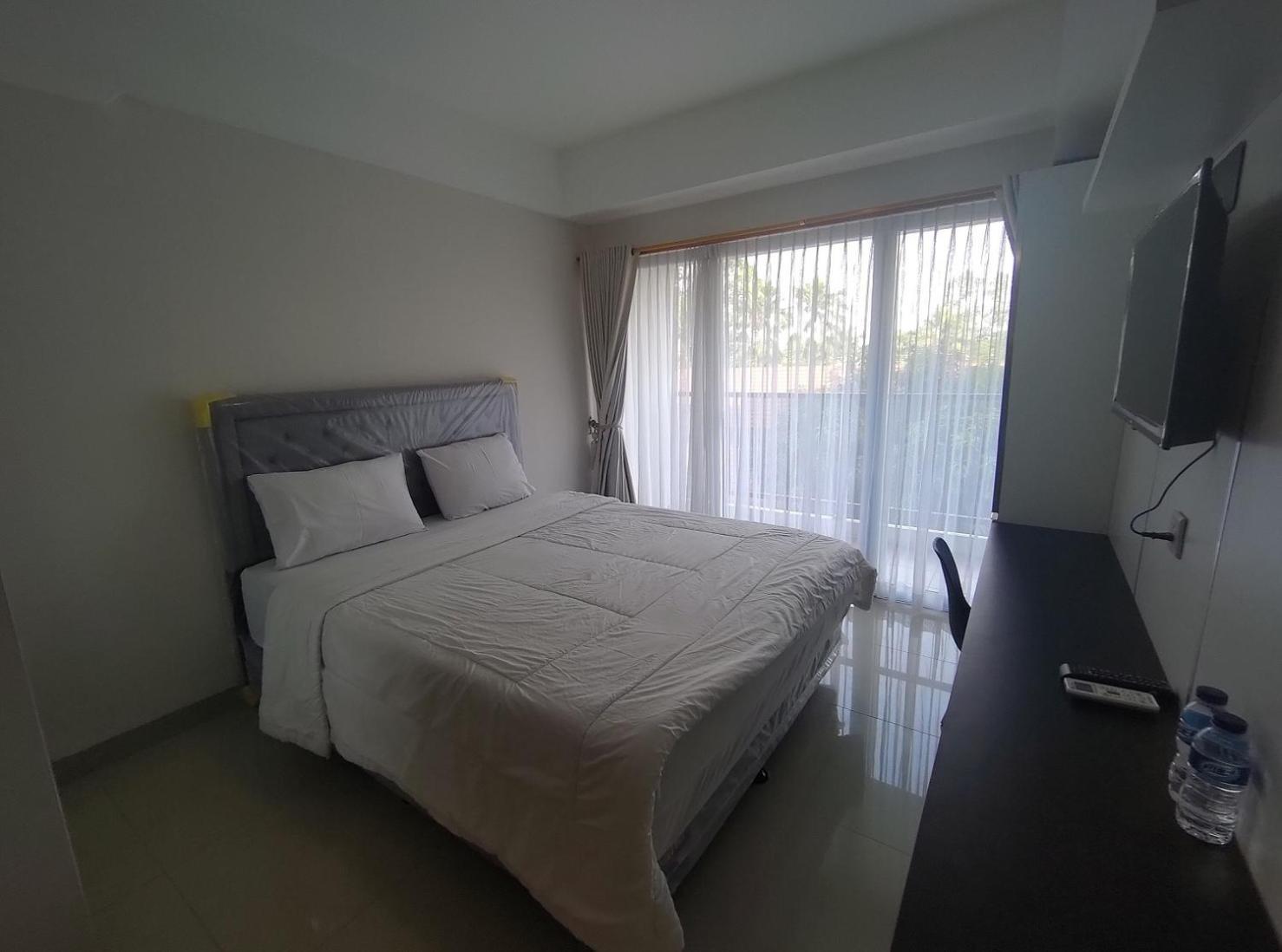 Padina Suites Tangerang Pokoj fotografie